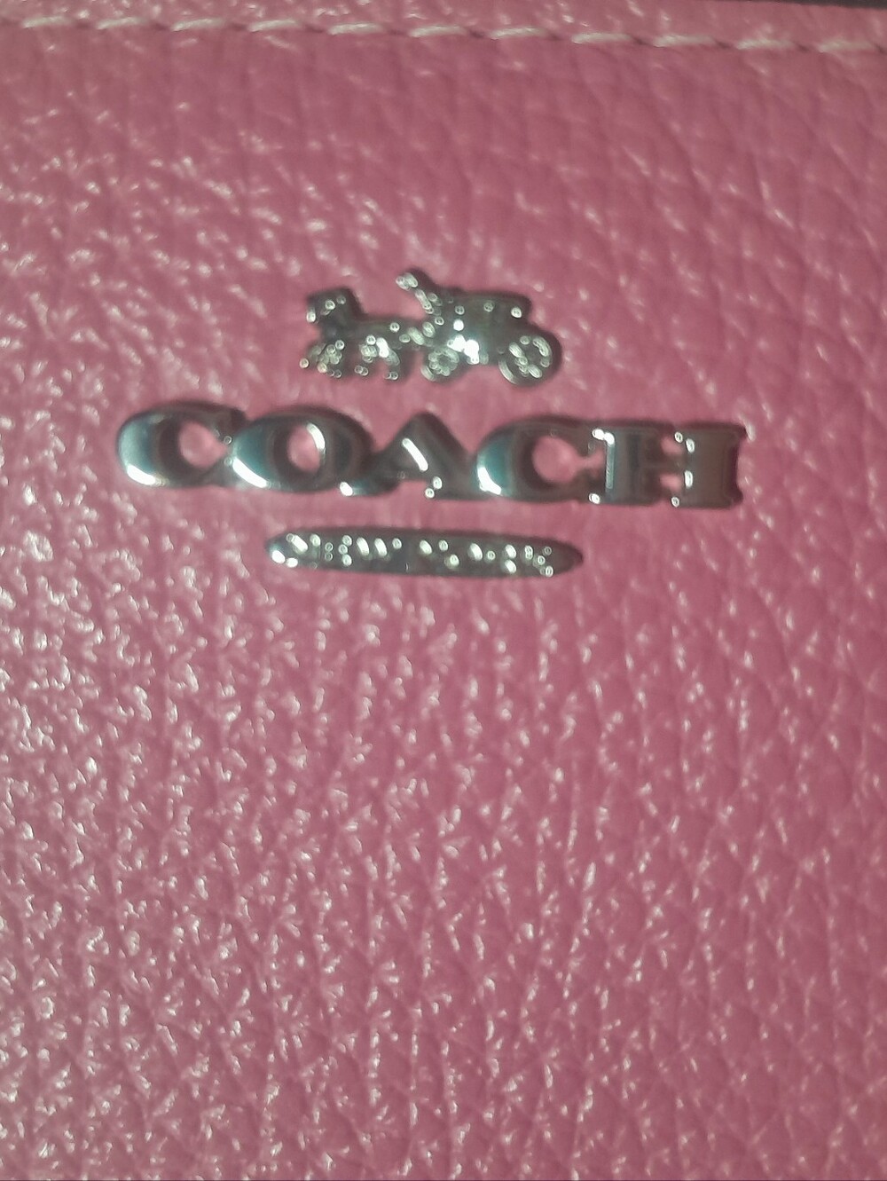 Coach Pink Phone Case with Silver 'LOVE' Logo Accent